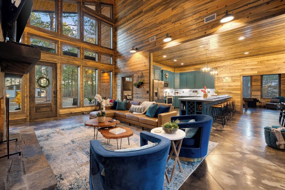 Spacious open-concept living with forest views 🌲
