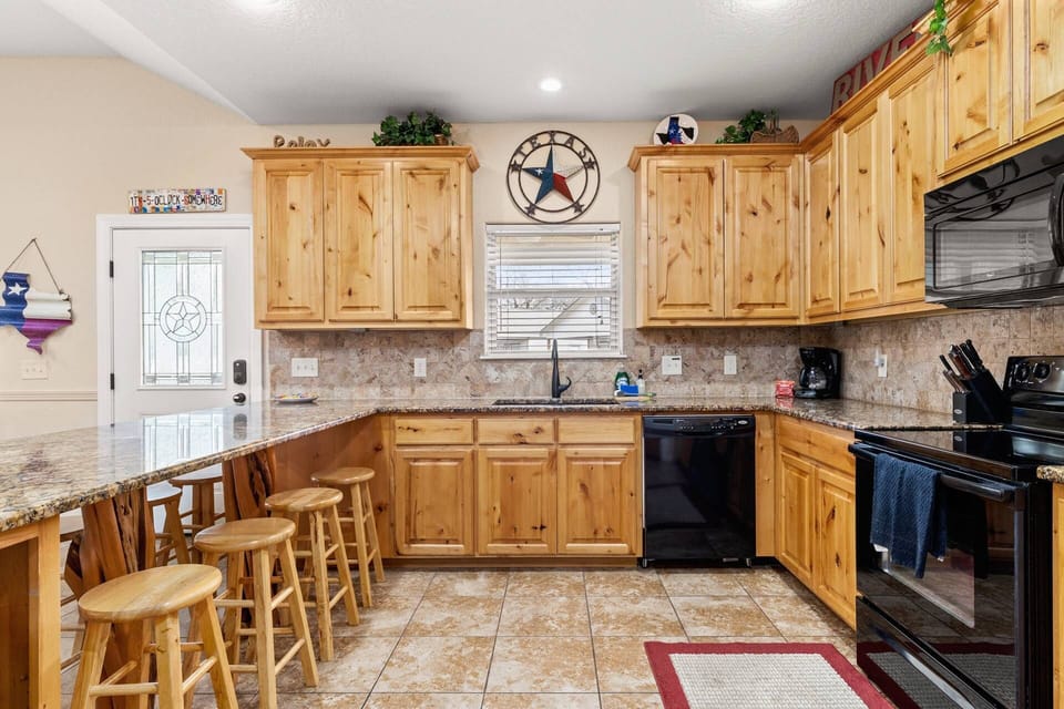 The eat-in kitchen is a perfect blend of style and functionality for delightful meals and group gatherings.