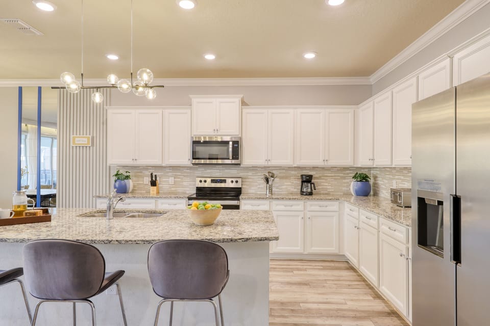 Additional seating at the kitchen counter.