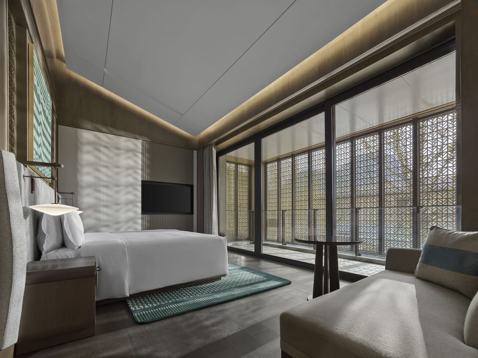 Suite, Garden View | Premium bedding, down comforters, pillowtop beds, free minibar items