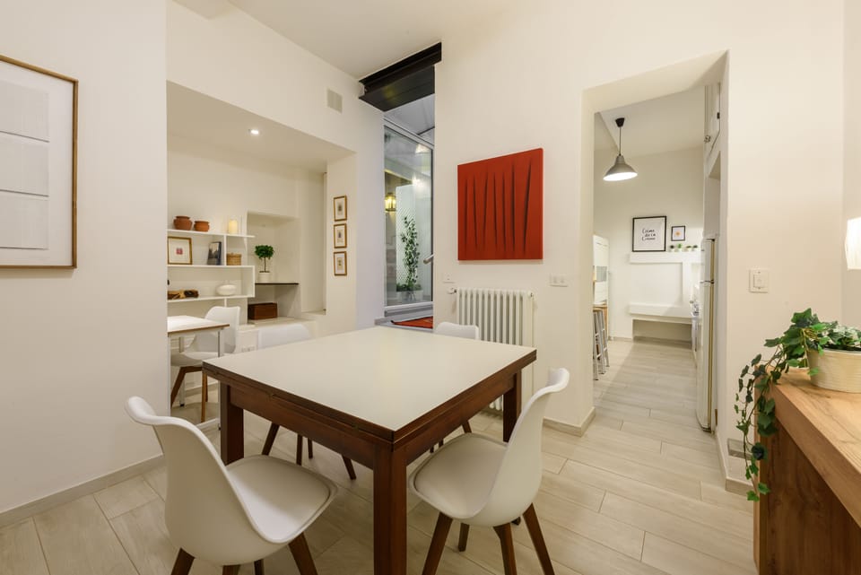 Deluxe Apartment | Living area | 40-inch flat-screen TV with digital channels