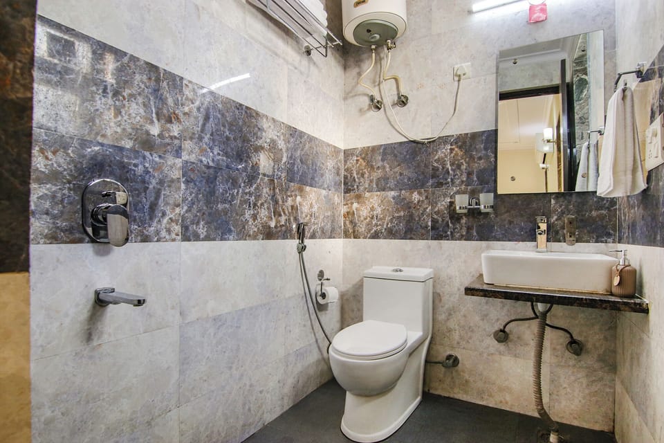 Premium Double Room | Bathroom | Shower, rainfall showerhead, designer toiletries, bidet