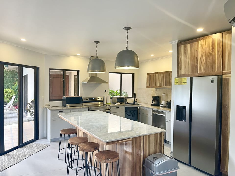 Condo, 4 Bedrooms | Private kitchen | Coffee/tea maker, fridge, oven, toaster