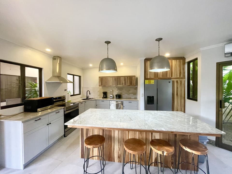 Condo, 4 Bedrooms | Private kitchen | Coffee/tea maker, fridge, oven, toaster