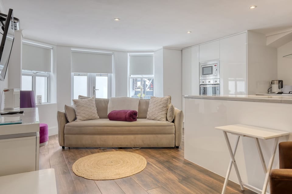 Living room with super comfortable sofa/bed to allow upto 4 guests 