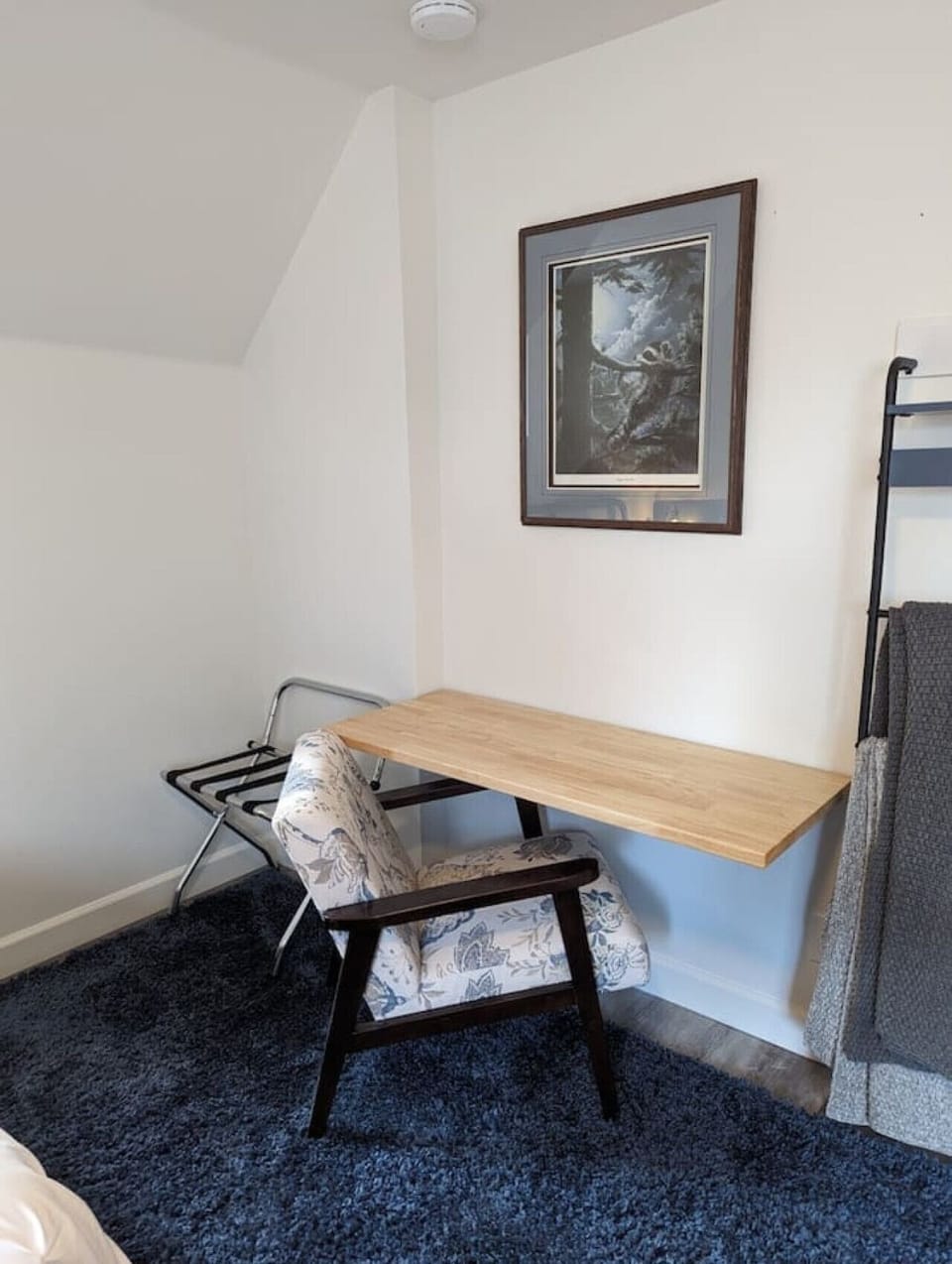 Functional desk workspace available in the second bedroom, providing a dedicated area for work or study.