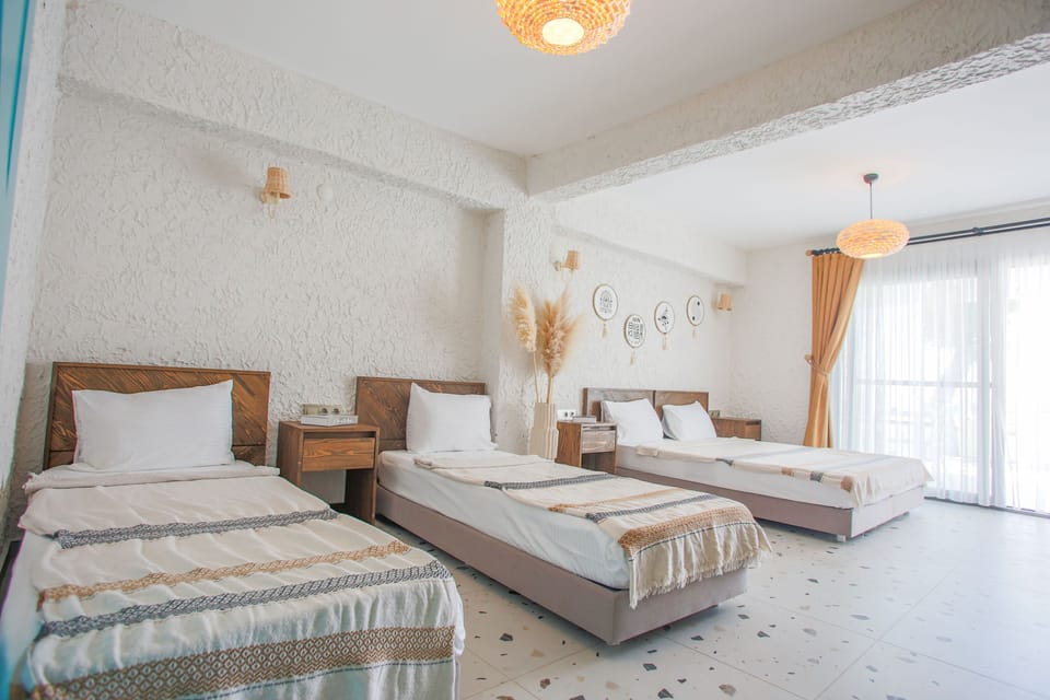 Superior Quadruple Room | Premium bedding, in-room safe, desk, laptop workspace