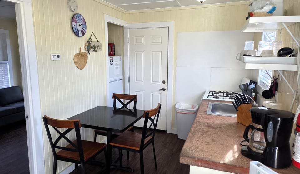 The dining area seats four and is a great place for game night or a puzzle
