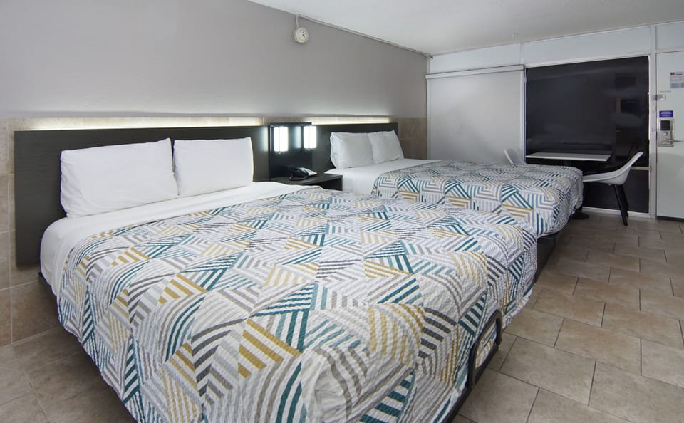 Standard Room, 2 Queen Beds, Non Smoking, Kitchen | Desk, blackout drapes, iron/ironing board, free WiFi