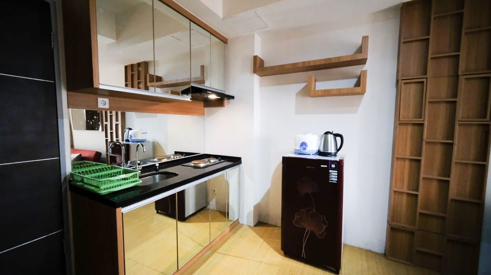 Standard Apartment | Private kitchen | Full-size fridge, stovetop