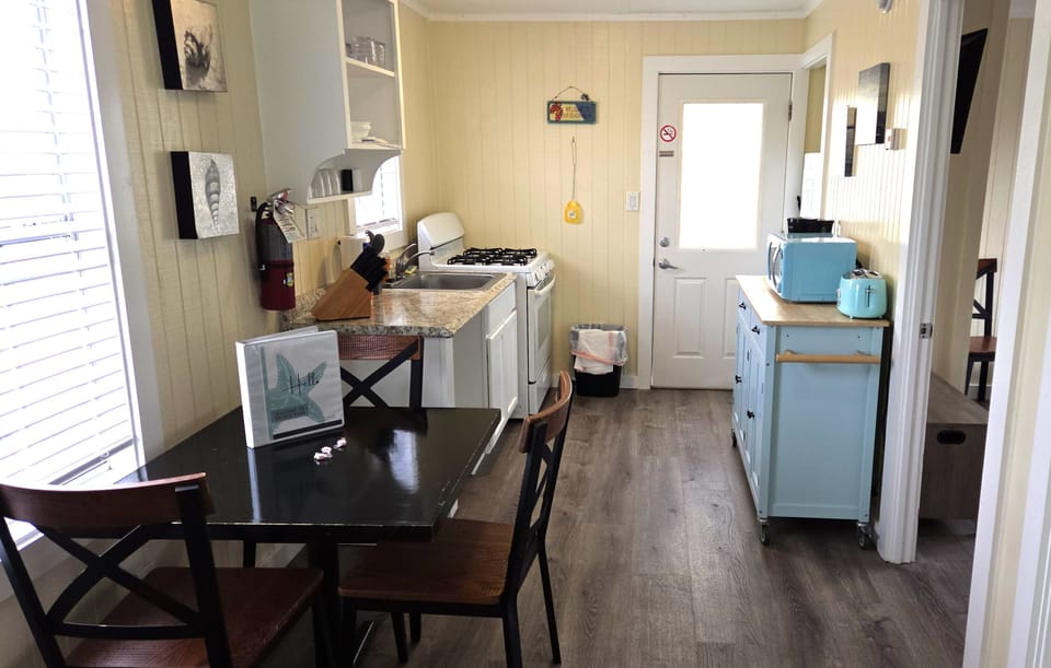 The cottage also has a dining area that seats four guests