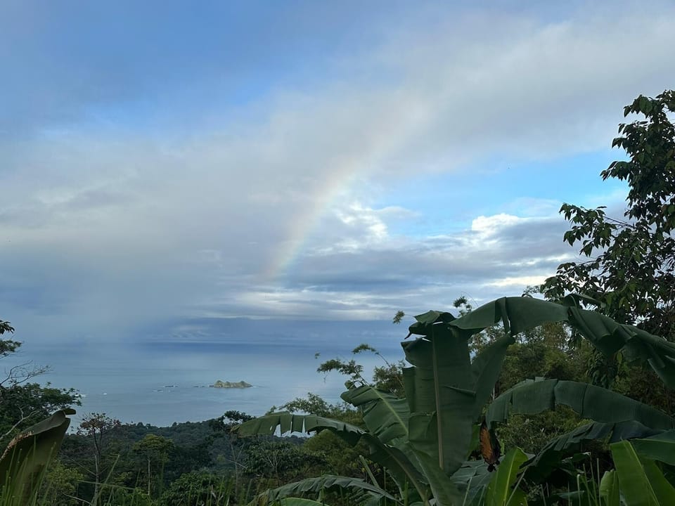 BEAUTIFUL RAINBOW IN THE OCEAN
