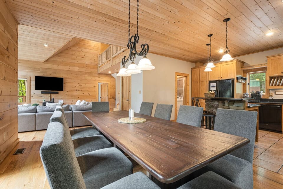 Gather around the table! This spacious dining room with a table that seats 10 is perfect for family meals, game nights, and making memories.