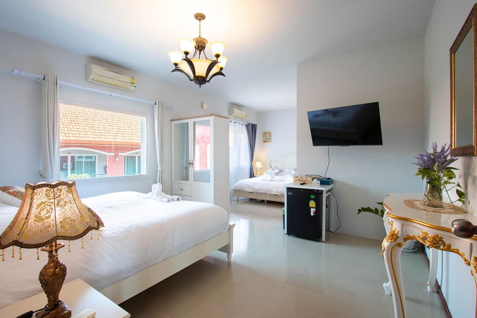 Family Quadruple Room, Multiple Beds, Non Smoking | In-room safe, individually decorated, free WiFi