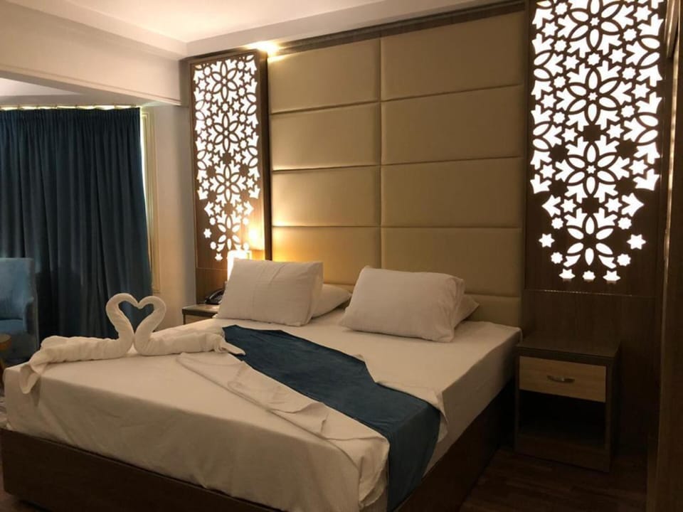 Family Suite, 2 Bedrooms, Pool View | In-room safe, free WiFi