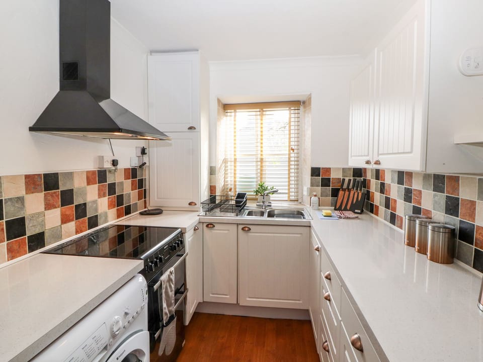 Fridge, electric kettle, toaster, cookware/dishes/utensils