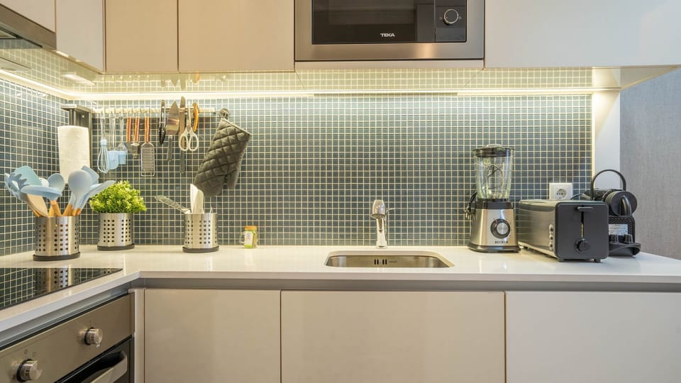 Experience the joy of cooking in our compact kitchenette – big flavors, small space. #CookingJoy #SmallKitchenGourmet
