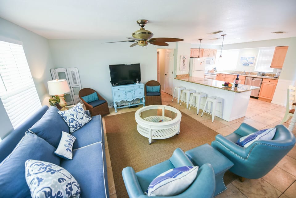 Open living area with flat screen TV