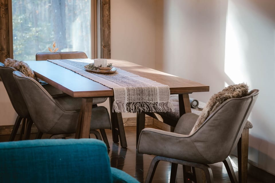 Dine together with peaceful forest views right outside the window.