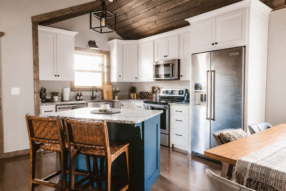 Full kitchen with everything you need and an island bar top.