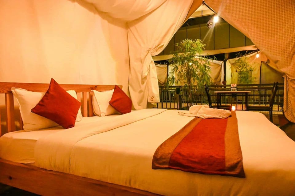 Deluxe Tent, 1 Bedroom, Non Smoking | 1 bedroom, Tempur-Pedic beds, in-room safe, individually decorated