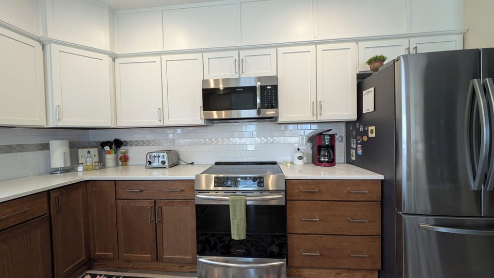 Induction Stove, Oven, Microwave, Toaster, Fridge, Freezer and a Coffee Maker