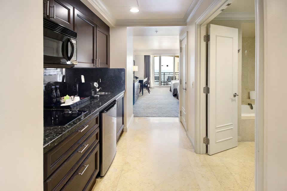 Layout of the condo from entrance.  Kitchen on the left, bathroom on right 
