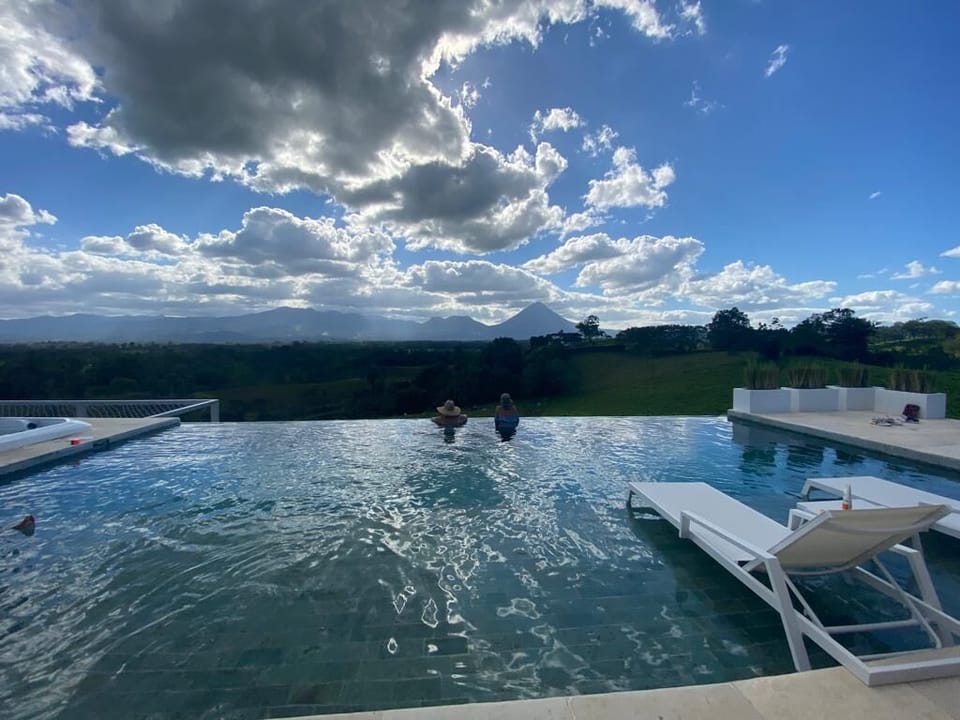 POOL WITH VIEW TO THE ARENAL VOLCANO