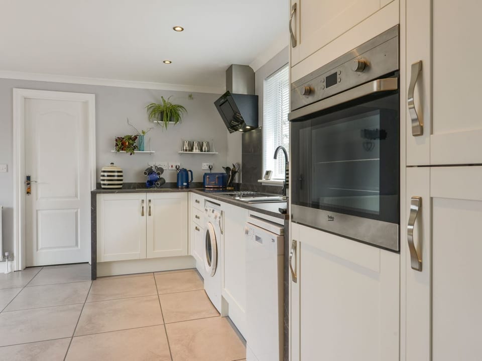 Fridge, dishwasher, electric kettle, cookware/dishes/utensils