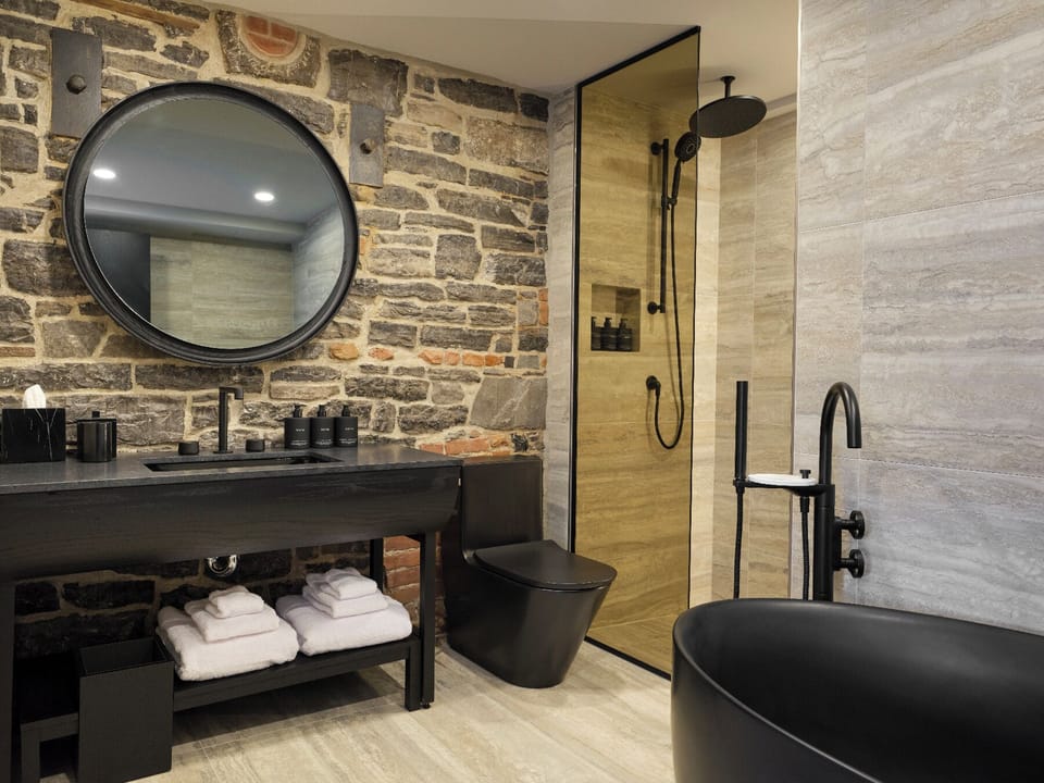 Signature Room | Bathroom | Free toiletries, hair dryer, bathrobes, slippers