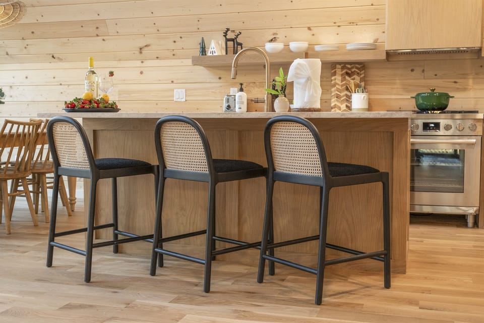 Kitchen: Gather around this stylish island bar, perfect for cocktails and conversation!
