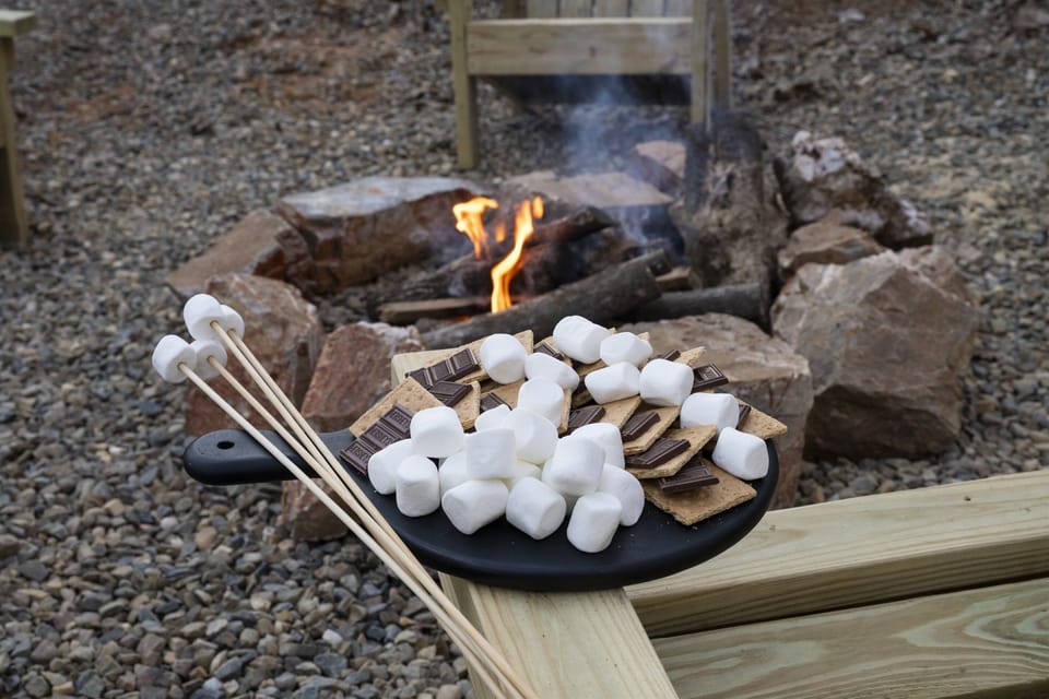 Fire Pit Gathering: Savor marshmallows and gooey s’mores by the crackling fire!