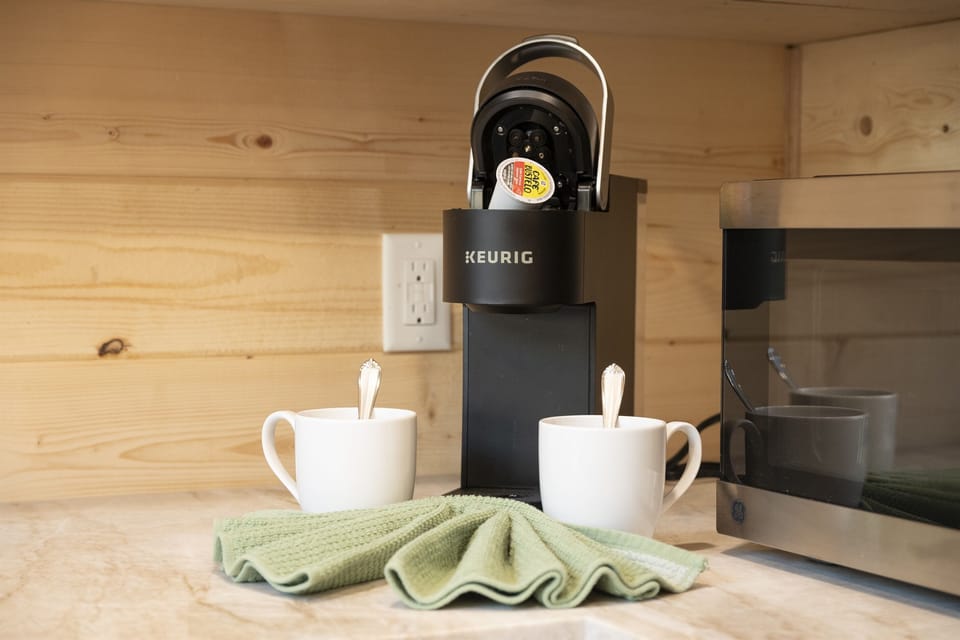 Coffee Corner: Brew your perfect cup with ease and delight in our charming Keurig setup!
