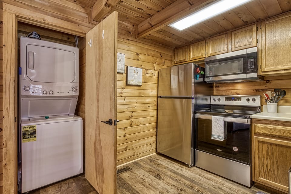 Kitchen with washer and dryer