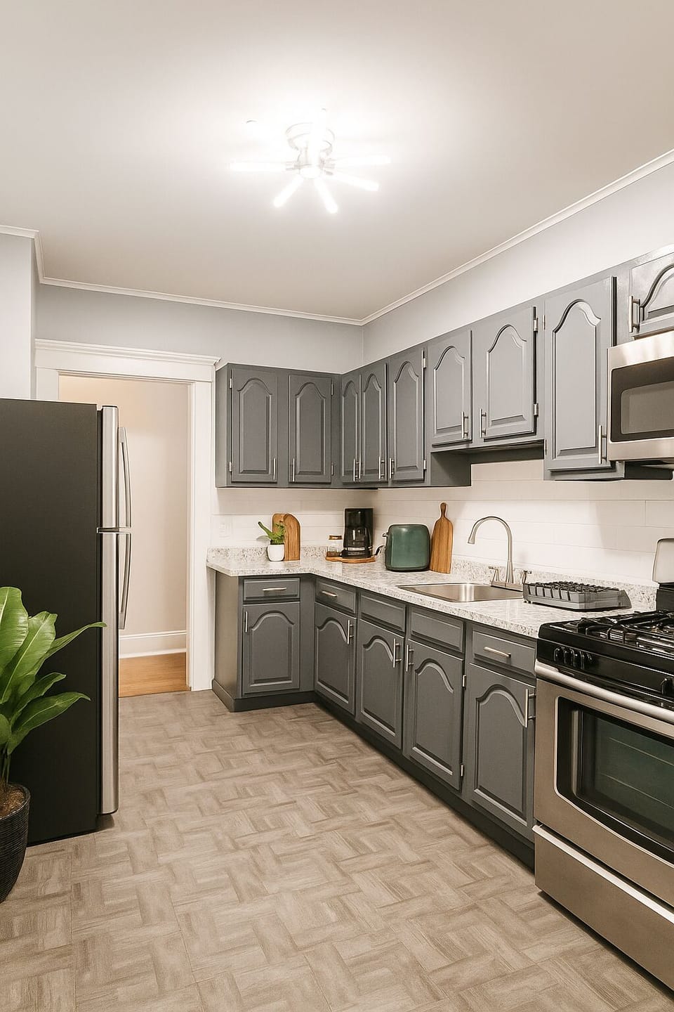 Modern layout with ample storage and stainless steel fridge