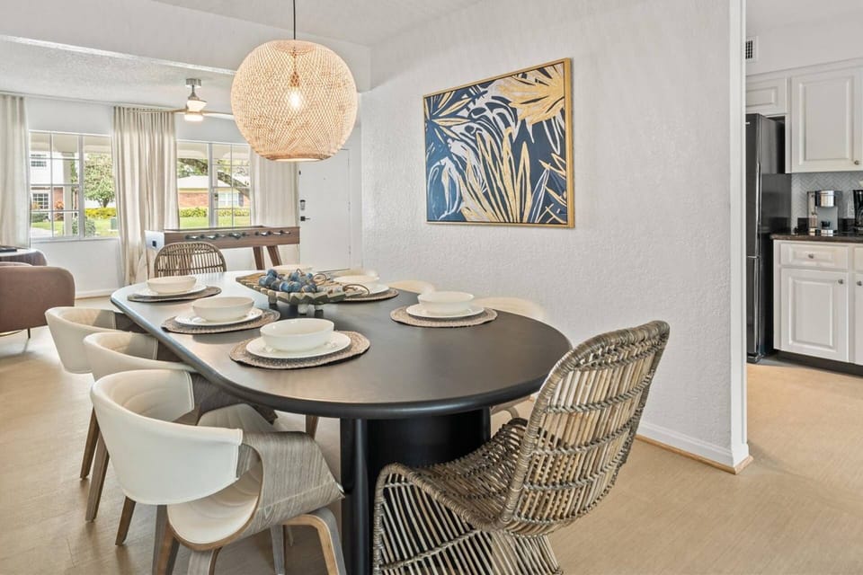 Dine with easy access to the kitchen and front living room