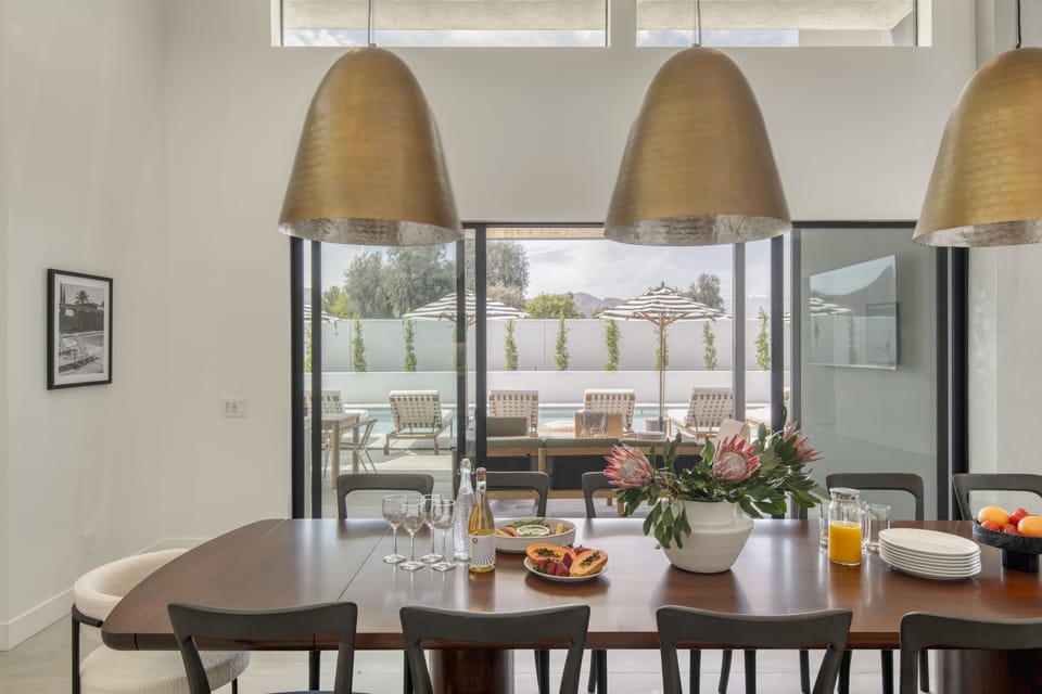 The dining room opens right into the pool area.