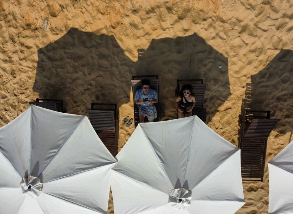 On the beach, white sand