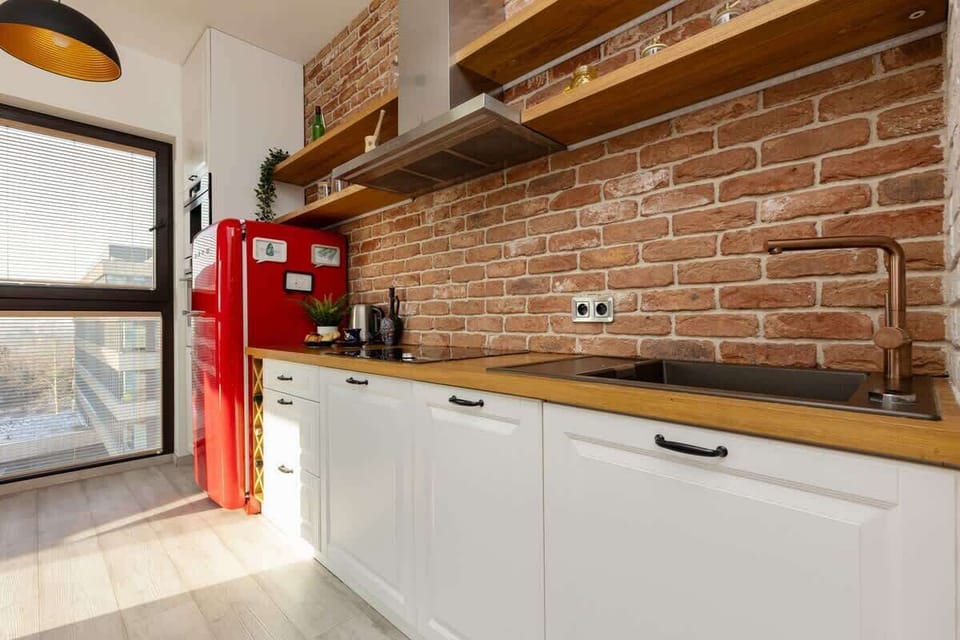 Separate kitchen with a coffee machine