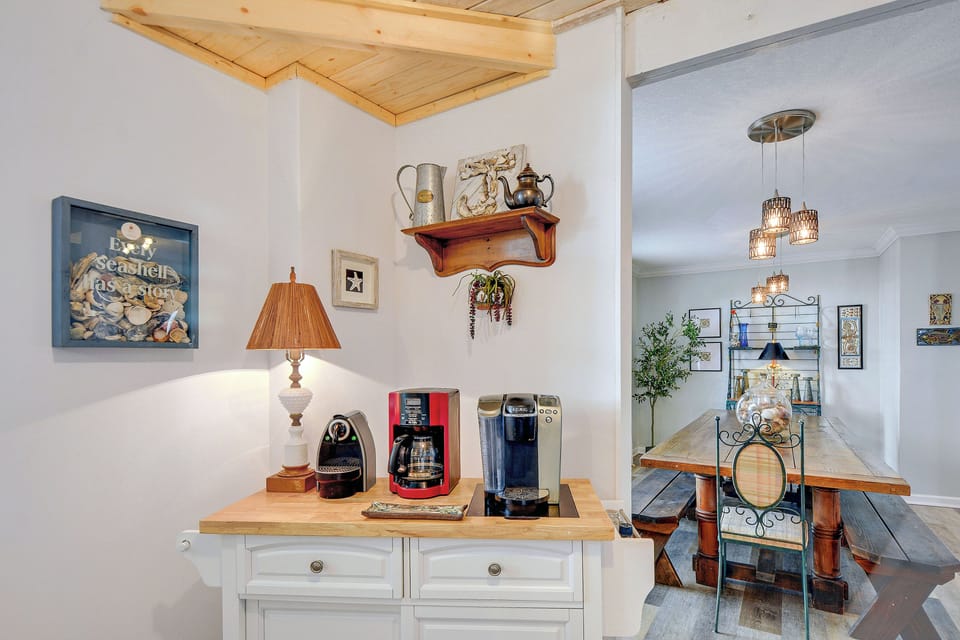 Coffee Bar Beside the Dining Room - Coffee station includes drip, pod, and Nescafe options beside the dining area for easy mornings.