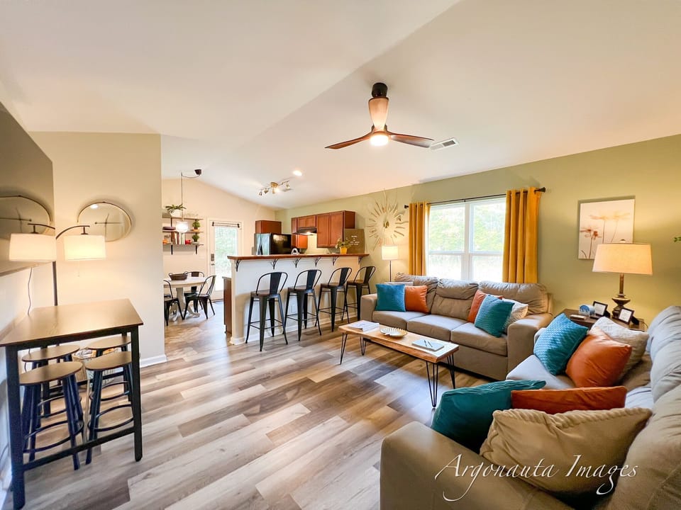 Open Concept Living, Dining, Kitchen with Vaulted Ceilings.