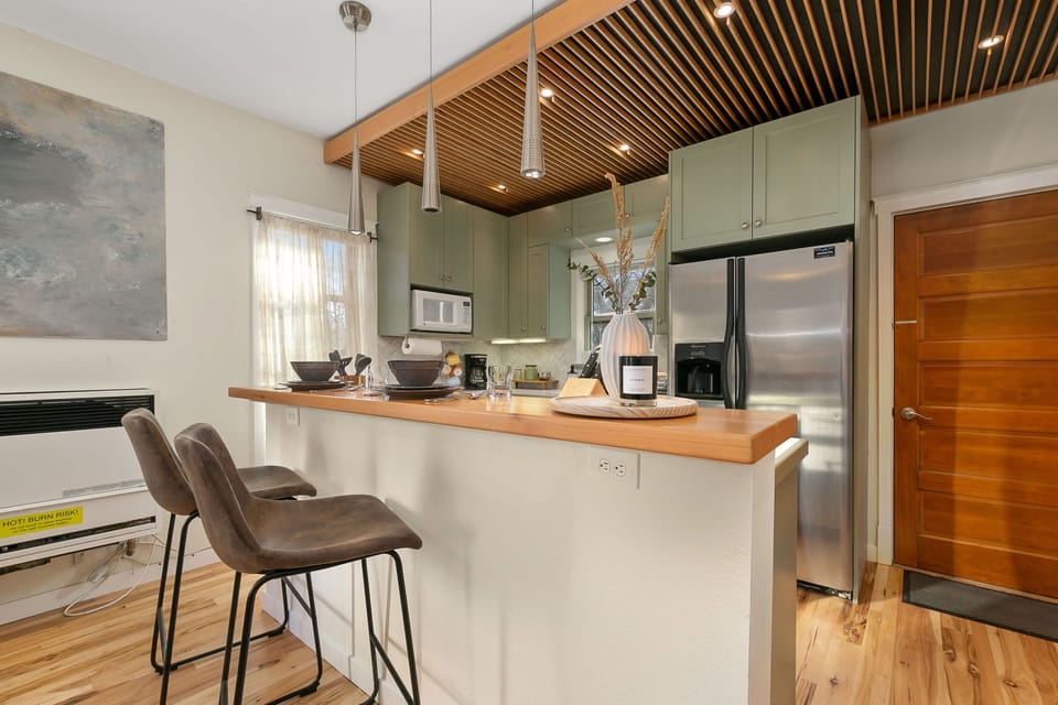 Bright and Airy Kitchen | Breakfast Bar with Seating for 3!