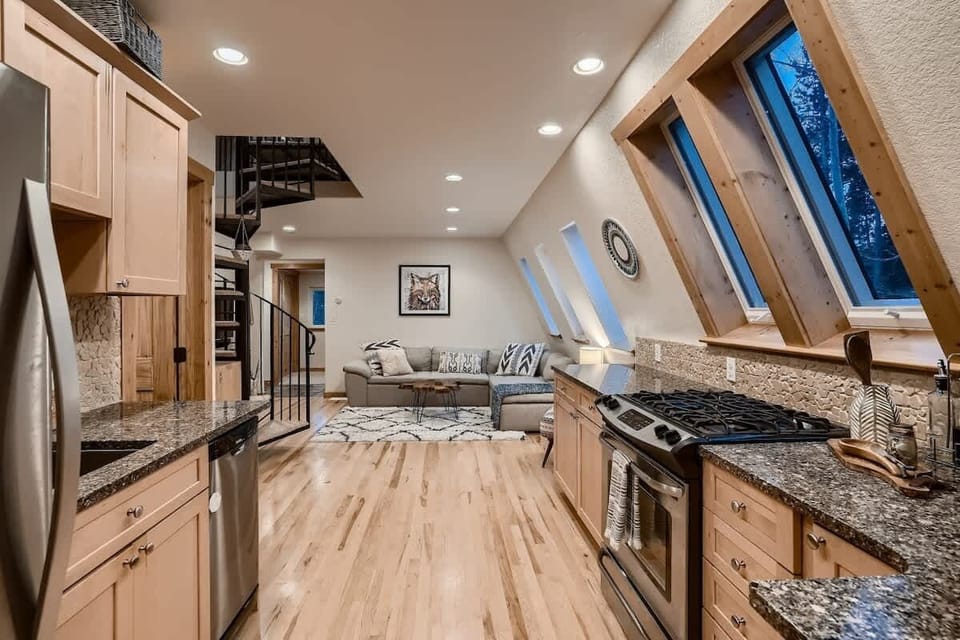 Experience the open main floor, designed to create a seamless flow between living, dining, and kitchen areas. The spacious layout is perfect for both entertaining and everyday living, offering a bright and airy atmosphere.