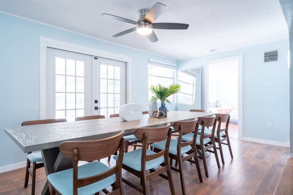 Gather around the table for dinners, board games, or work sessions. The dining room opens to the lanai through the large french doors. The table seats 12 with 4 extra chairs available.