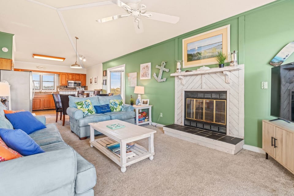 Living area is convenient to dining and kitchen; half bath is also on this level