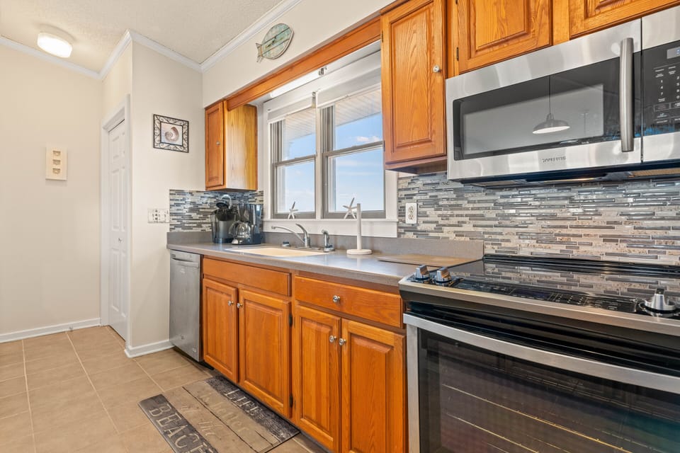 Fully stocked kitchen; Keurig, drip coffee pot, large pantry just beyond