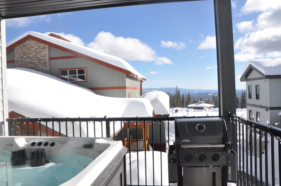 Private salt water hot tub and BBQ with views of the Monashee mountains