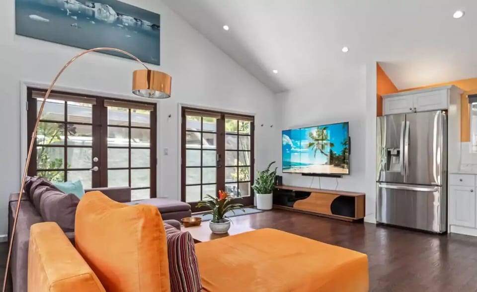 Living room with large 75 inch TV