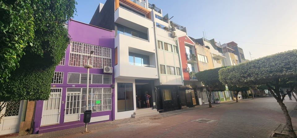 Plateau Neighborhood in City of Praia. apt on Rua Pedonal's tree covered street