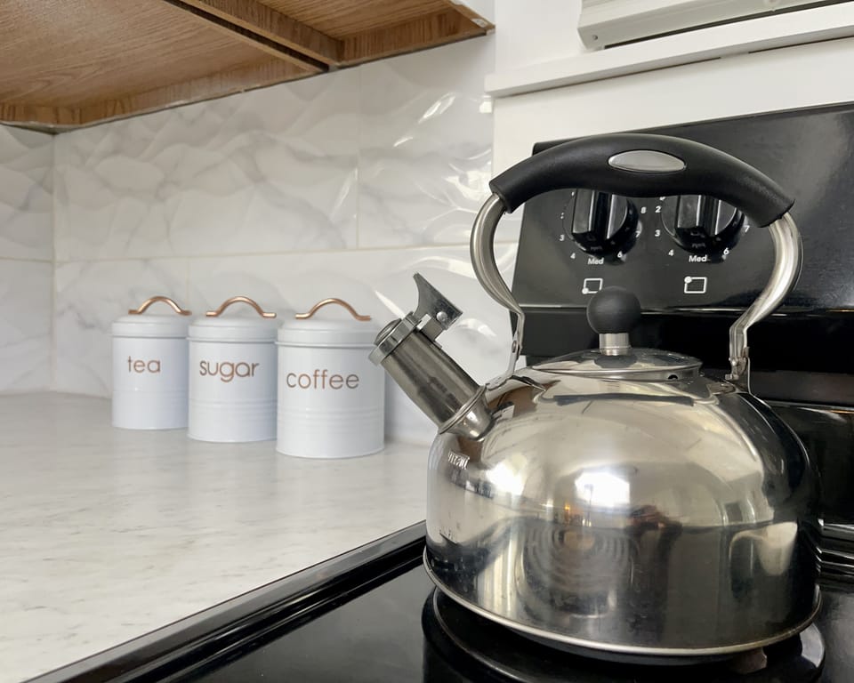 We've got coffee, tea, sugar, honey, creamer...all the goods!